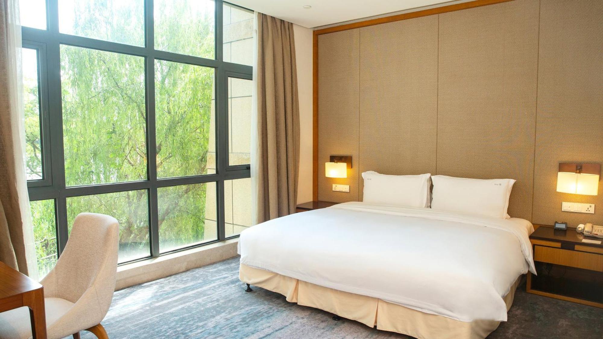 Holiday Inn Kunshan Huaqiao By Ihg Экстерьер фото